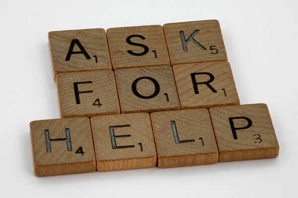 a sign saying ask for help