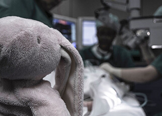 an operating theatre with a child's toy in it